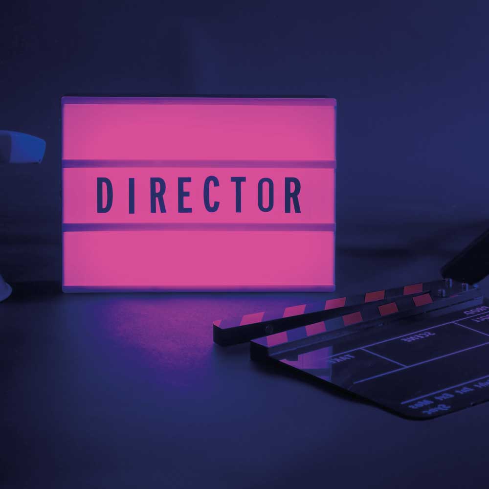 a Illuminated light box with pink leds with black text to the face