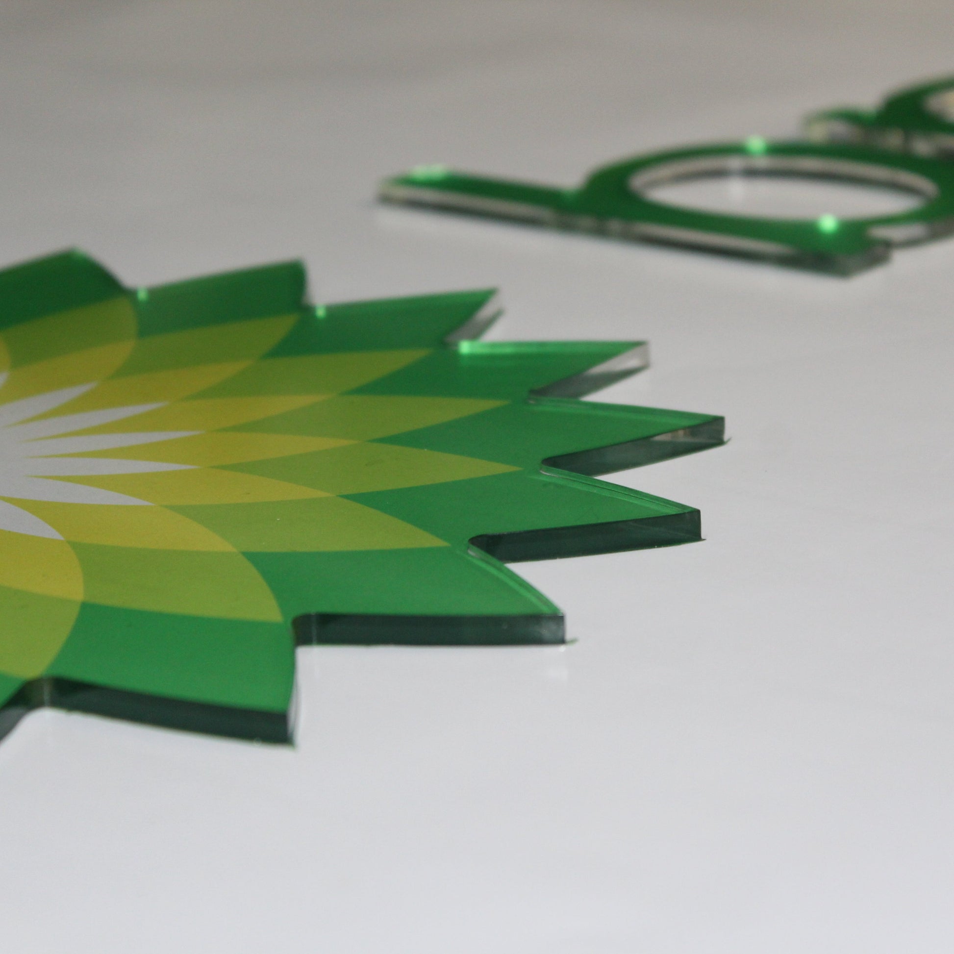 green wall logo printed in colours