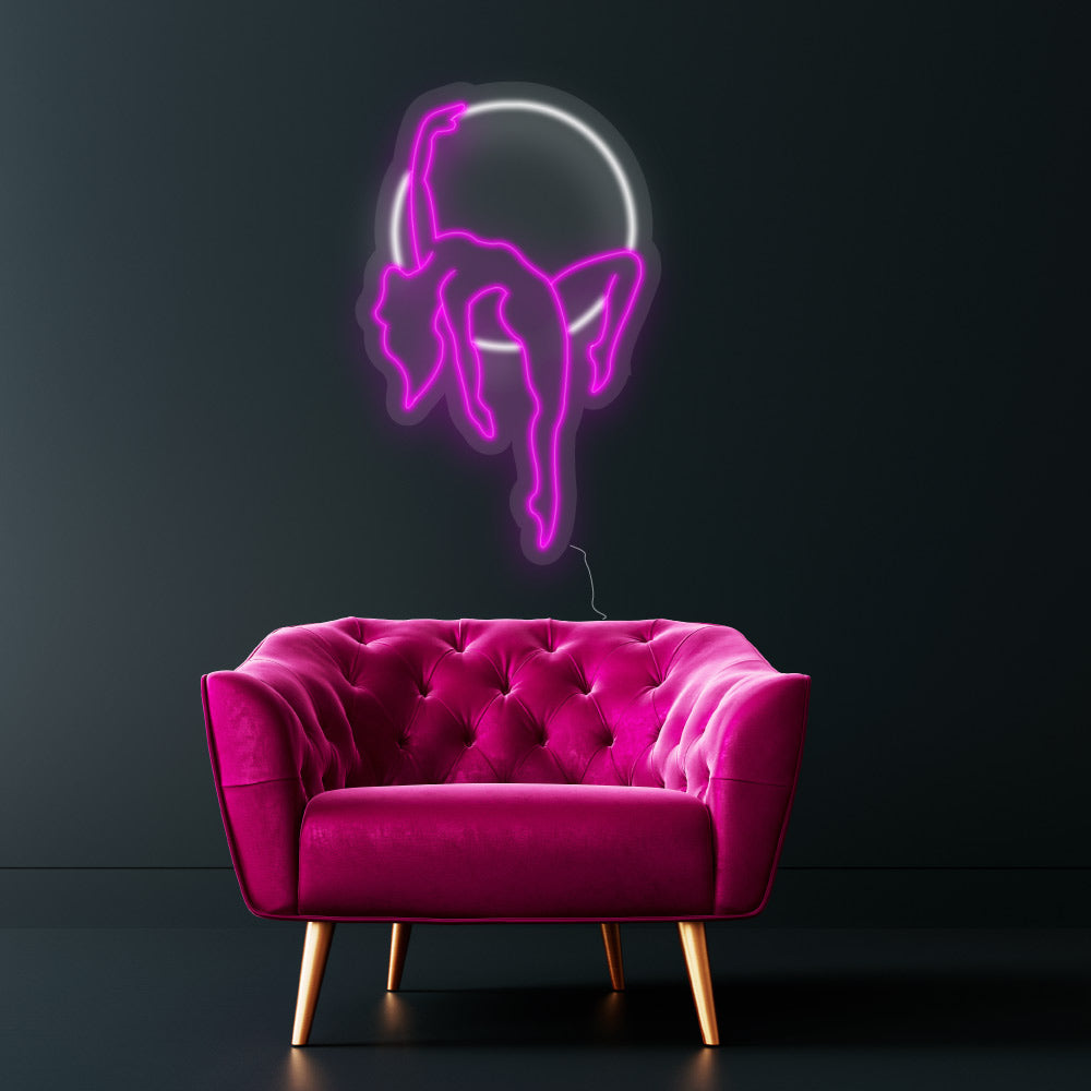 aerial hoop dancer on a neon hoop