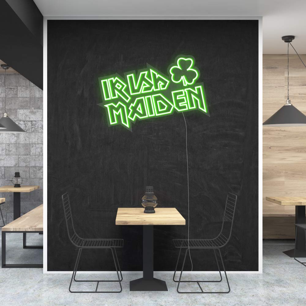 a irish sign on a cafe wall in green leds