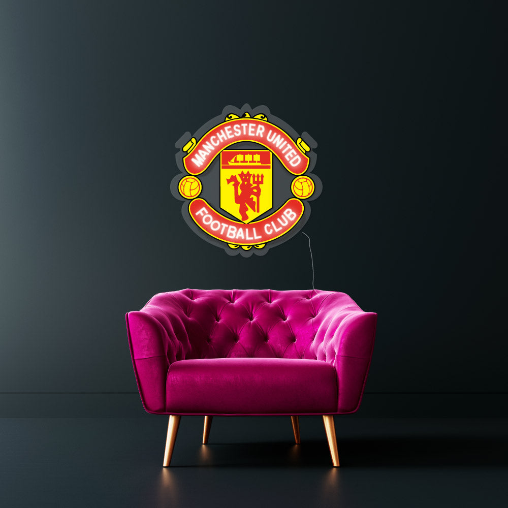 a printed neon sign of a football club man u