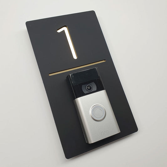 vertical house sign with ring doorbell