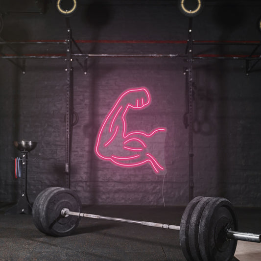 a shape of a arm bicep neon sign in a bright pink