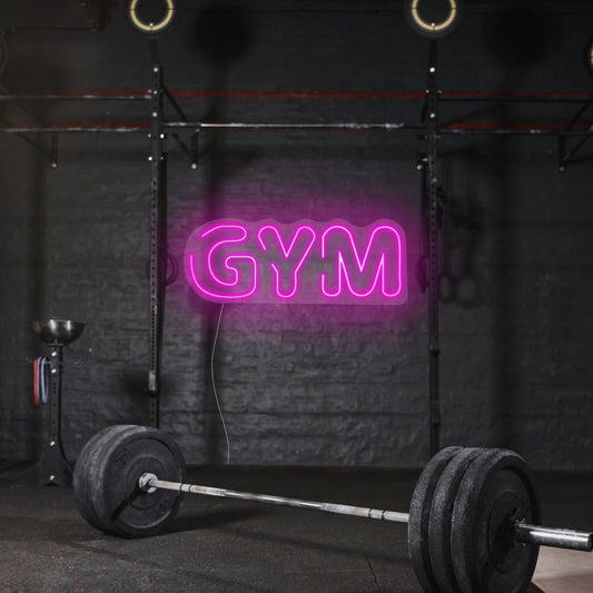 bright pink light neon sign saying gym