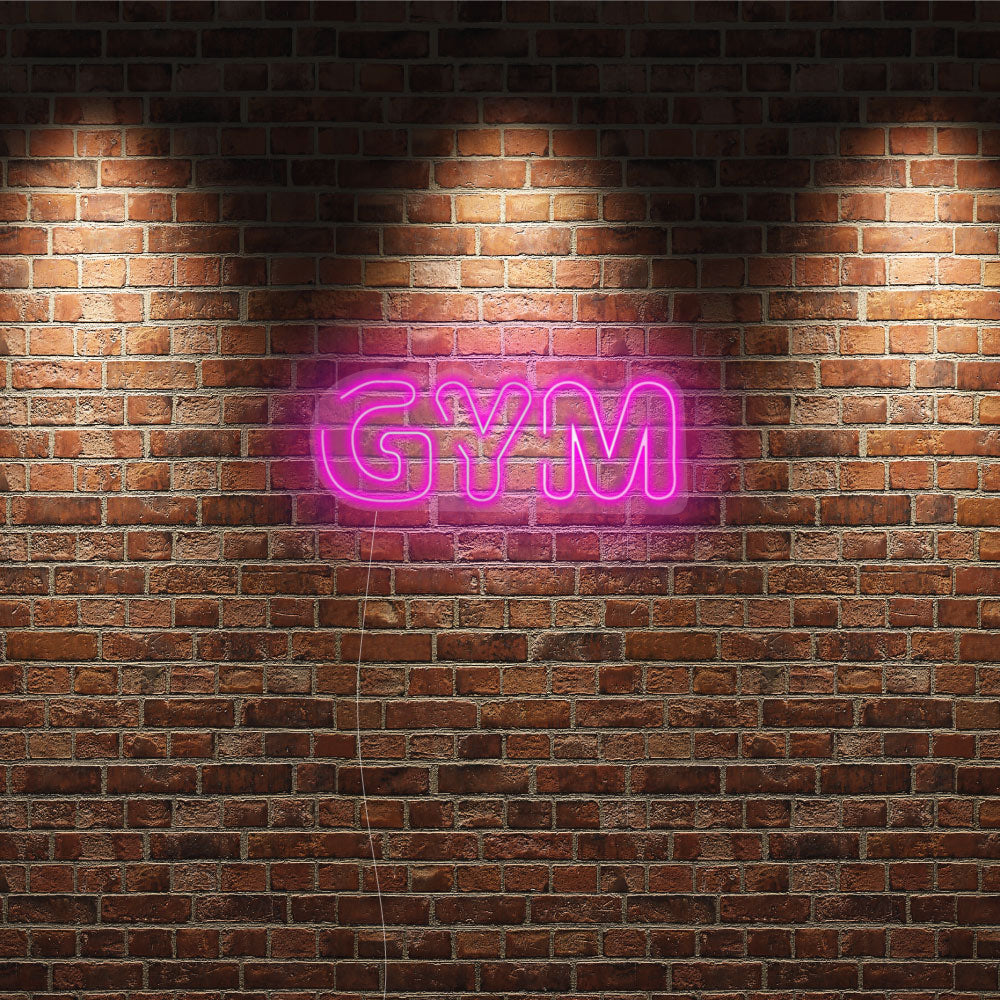 a gym neon displayed on a gym wall