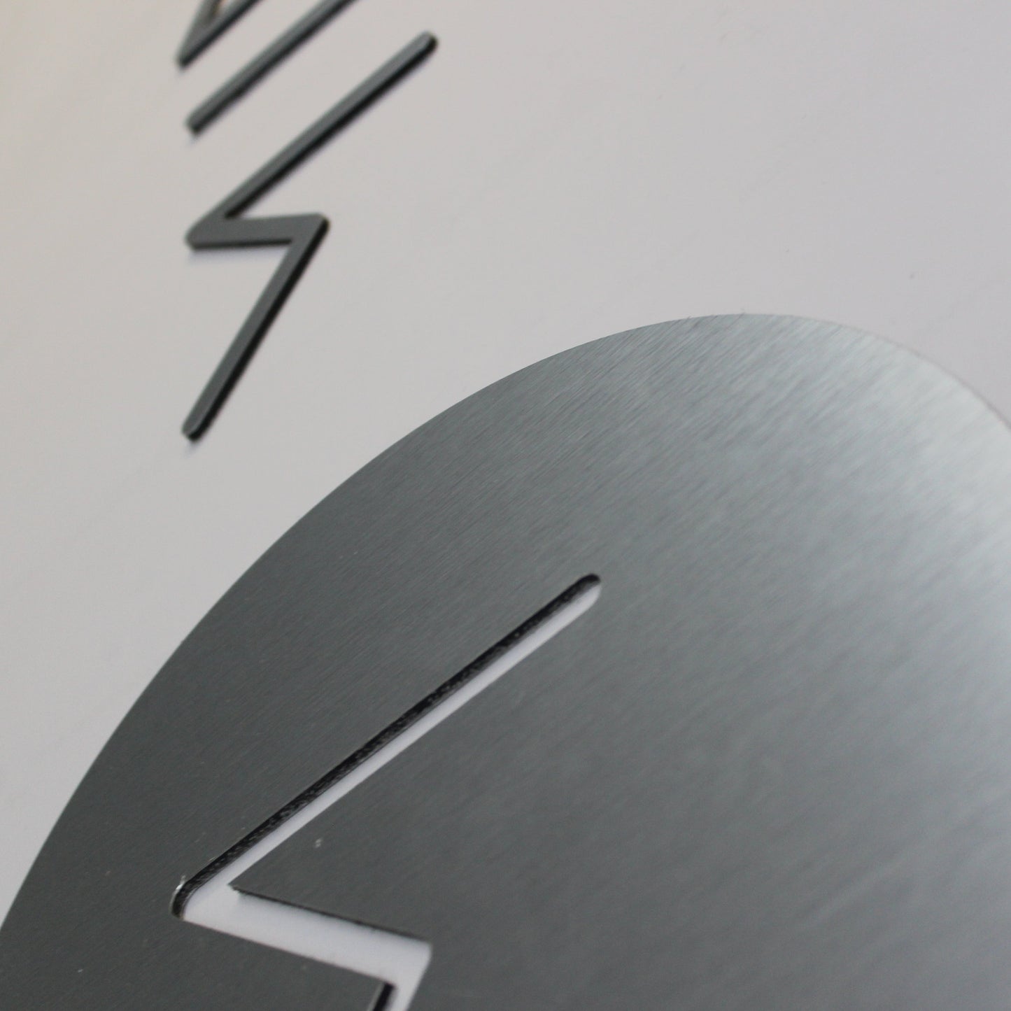 minimal contemporry logo close up with cut away logo elements