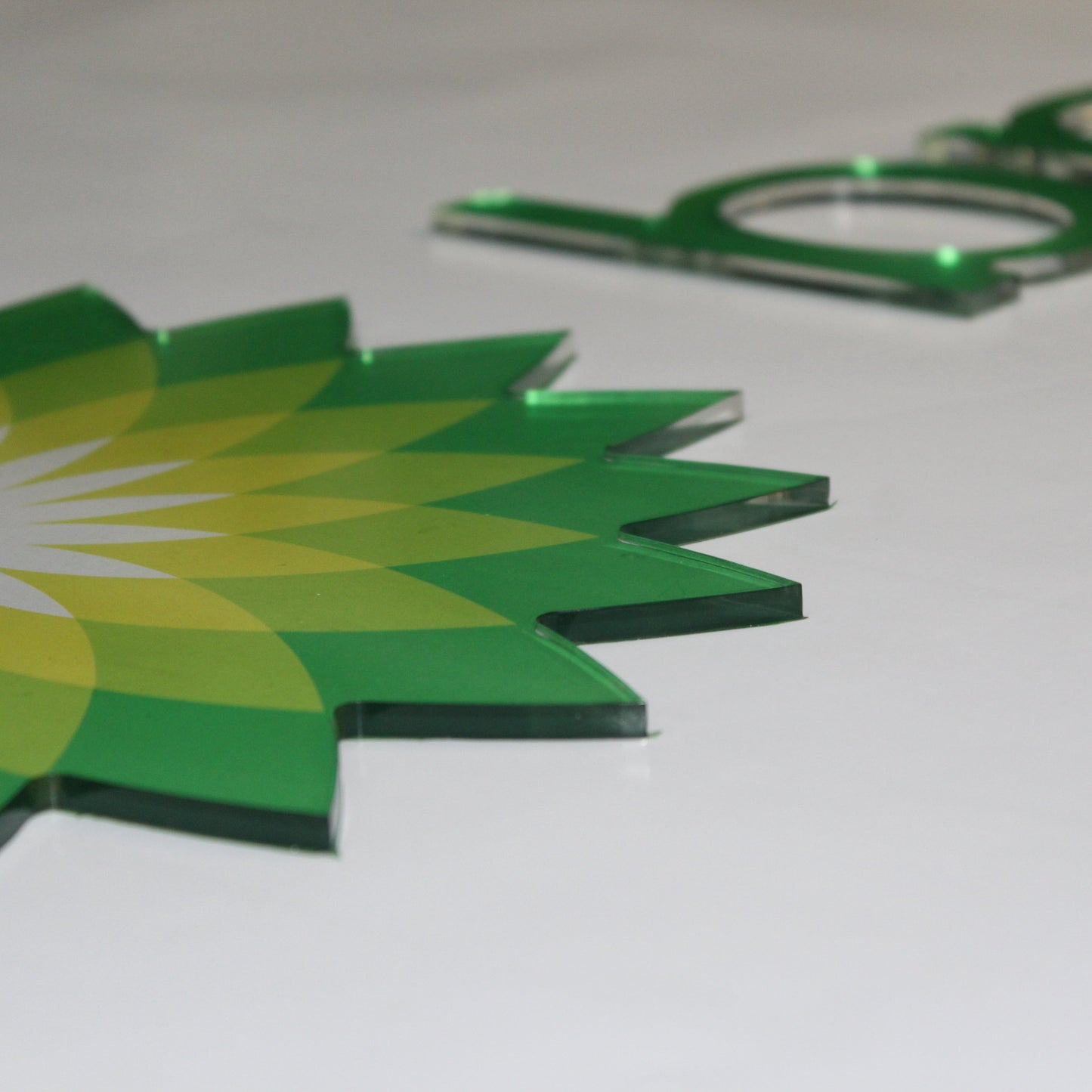 green wall logo printed in colours 