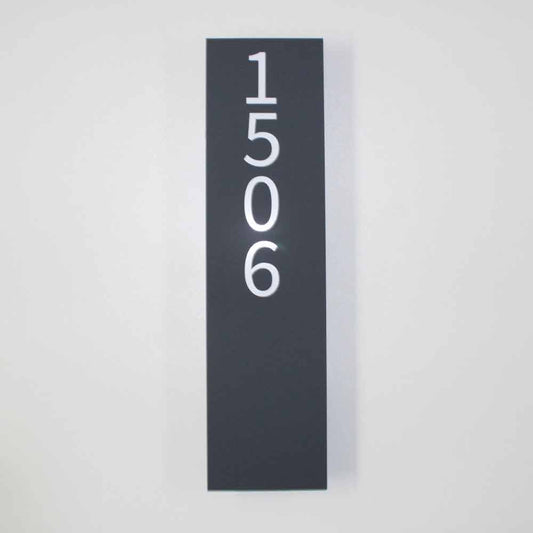 Large vertical house sign in grey with white numbers on