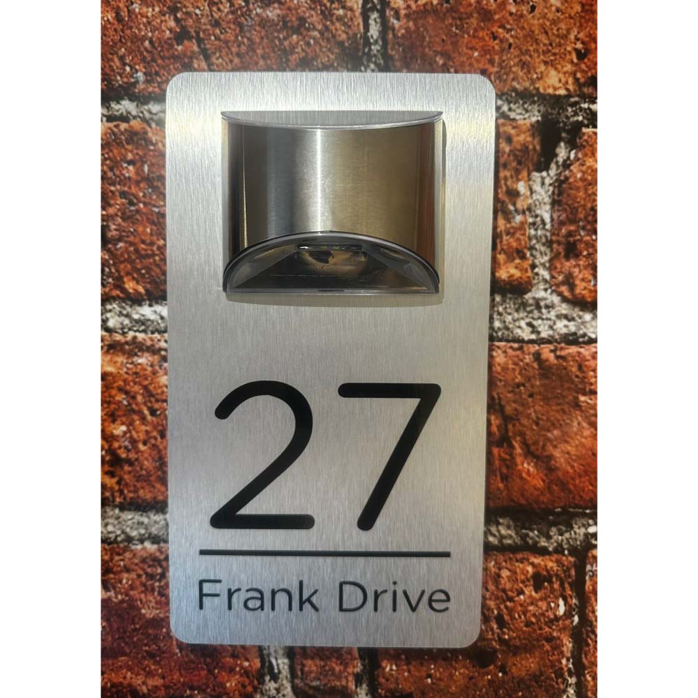 brushed silver house sign with black numbers