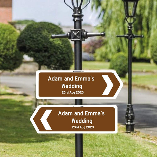 wedding direction sign with arrows pointing the way